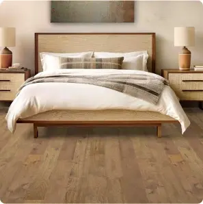 Mohawk hardwood flooring in a finished bedroom